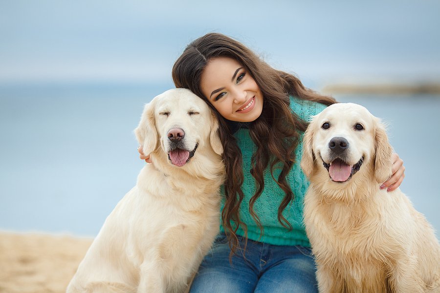 Human Teeth vs Animal Teeth information Blog woman with two dogs